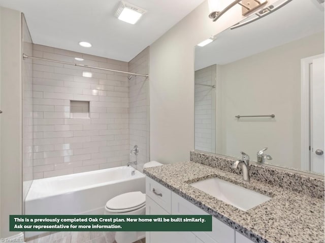 bathroom featuring tub / shower combination, vanity, and toilet