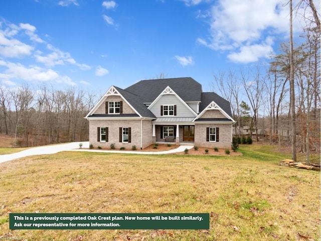 view of front of home featuring a front lawn