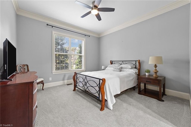bedroom featuring baseboards, ornamental molding, ceiling fan, and light carpet