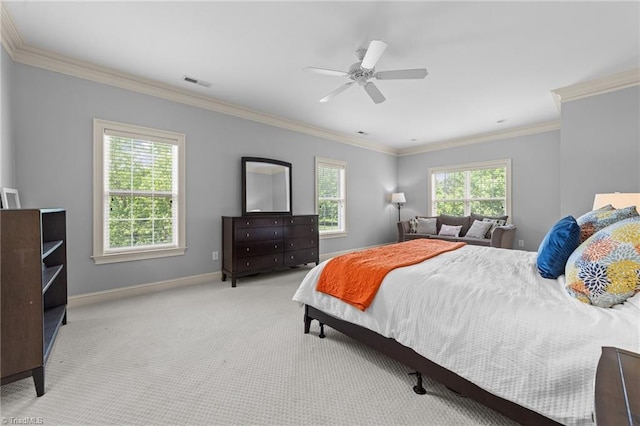 bedroom featuring baseboards, ornamental molding, and visible vents
