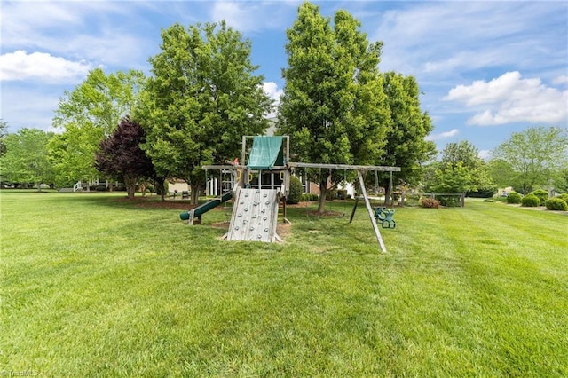 view of jungle gym featuring a yard