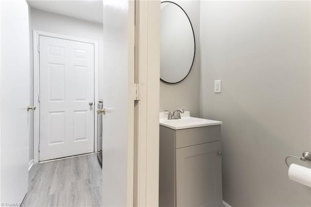 3602 Turquoise Dr, Durham, NC 27703 - bathroom with vanity and wood finished floors