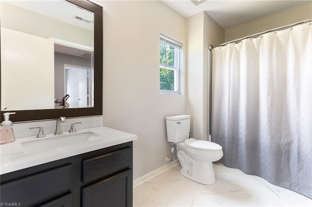 3602 Turquoise Dr, Durham, NC 27703 - bathroom with toilet, vanity, marble finish floors, baseboards, and curtained shower