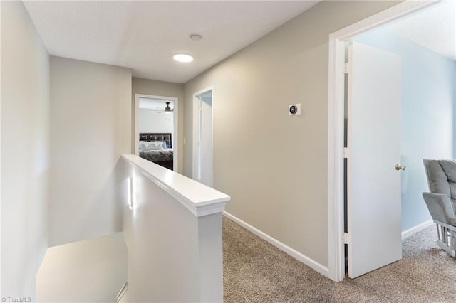 3602 Turquoise Dr, Durham, NC 27703 - hall featuring an upstairs landing, carpet, and baseboards