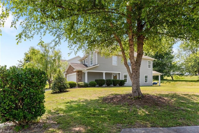 3602 Turquoise Dr, Durham, NC 27703 - view of front facade with a front lawn and a garage