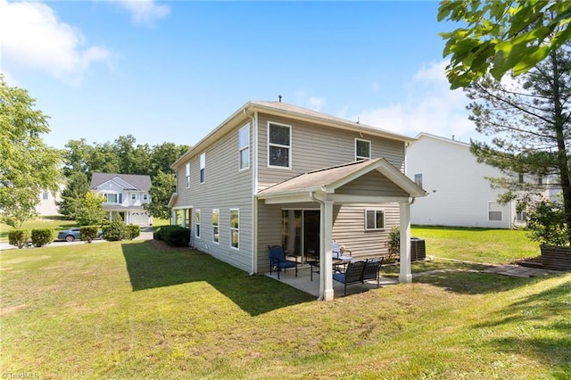 3602 Turquoise Dr, Durham, NC 27703 - back of property with a patio, a lawn, cooling unit, and an outdoor hangout area