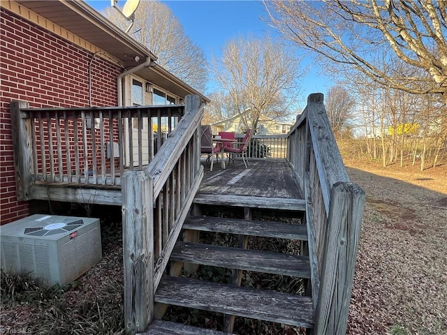 wooden terrace with central AC unit