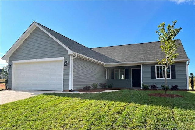 ranch-style home featuring a garage and a front yard