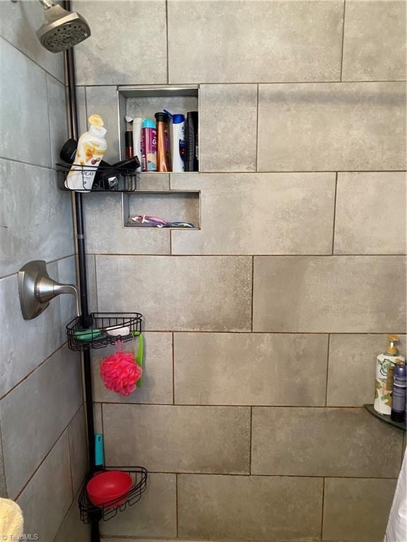 details featuring a tile shower