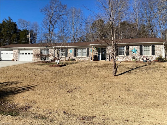 single story home with a front yard and a garage