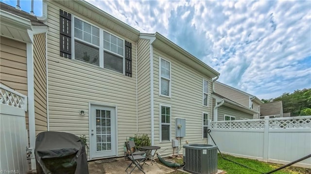 104 Tilleys Grove Dr, Kernersville, NC 27284 - rear view of property with a patio
