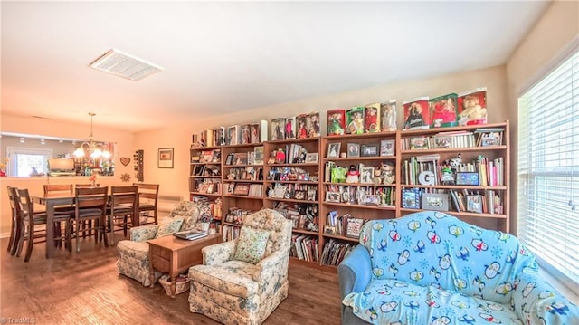 104 Tilleys Grove Dr, Kernersville, NC 27284 - sitting room featuring plenty of natural light and a chandelier