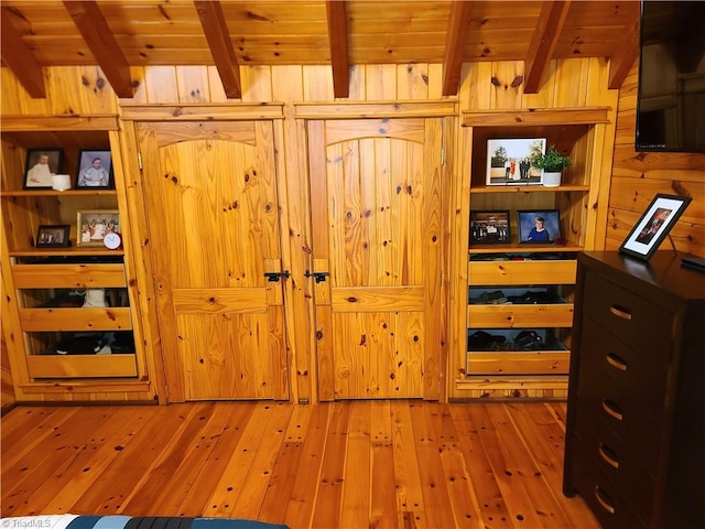 room details with hardwood / wood-style flooring, beam ceiling, and wooden ceiling