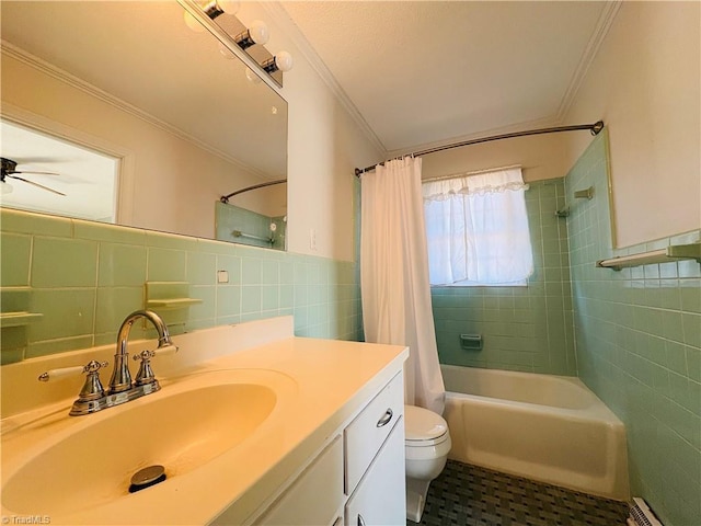 bathroom featuring ornamental molding, baseboard heating, and tile walls