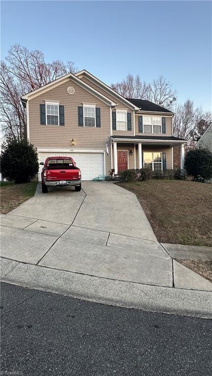 view of front of house with a garage