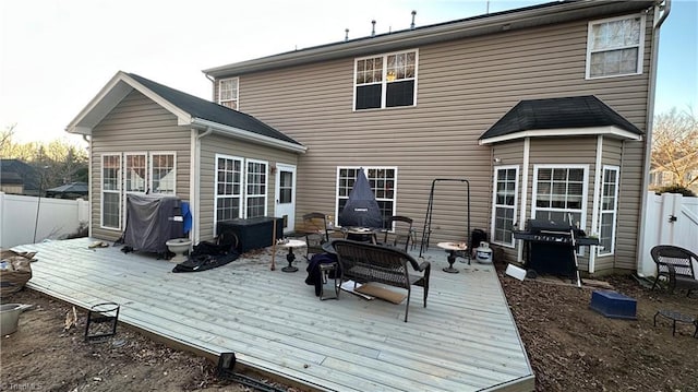 rear view of house with a deck