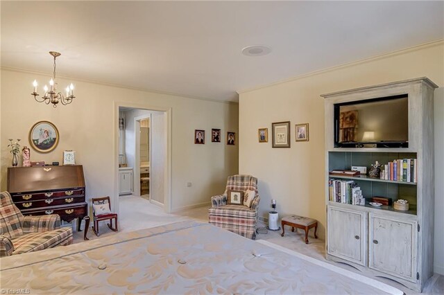 bedroom featuring ensuite bathroom, light carpet, crown molding, baseboards, and an inviting chandelier