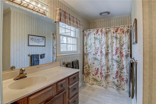 full bathroom with wallpapered walls, curtained shower, and vanity