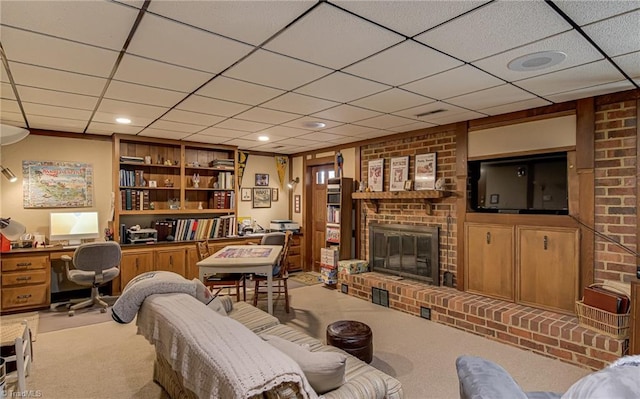 living area featuring a brick fireplace, carpet, and visible vents