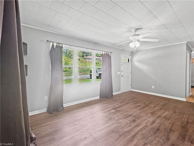 964 Mountain View Rd, North Wilkesboro, NC 28659 - unfurnished living room featuring wood finished floors, ceiling fan, and baseboards
