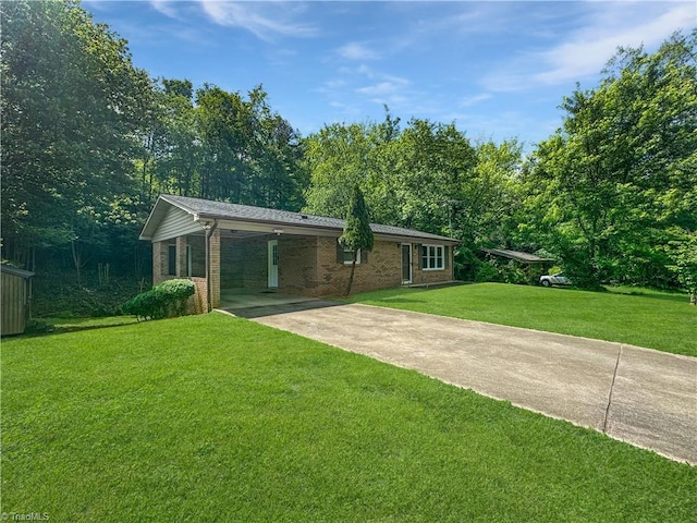 964 Mountain View Rd, North Wilkesboro, NC 28659 - ranch-style house with concrete driveway, brick siding, a front lawn, and a carport