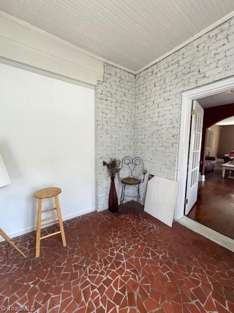 sitting room featuring baseboards