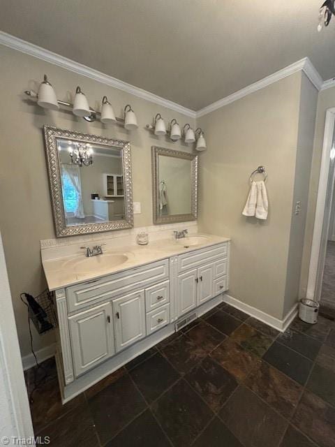 full bathroom with crown molding, baseboards, double vanity, and a sink