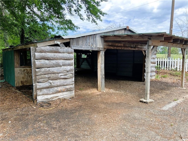 1716 US Highway 220, Stokesdale, NC 27357 - view of outbuilding with fence and a carport
