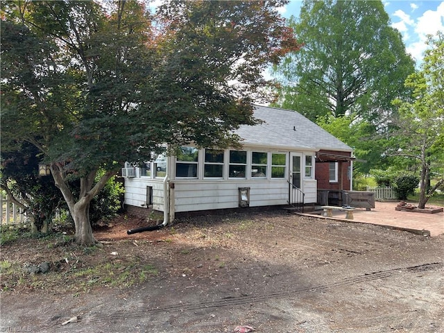 1716 US Highway 220, Stokesdale, NC 27357 - view of front of house with a patio and a shingled roof