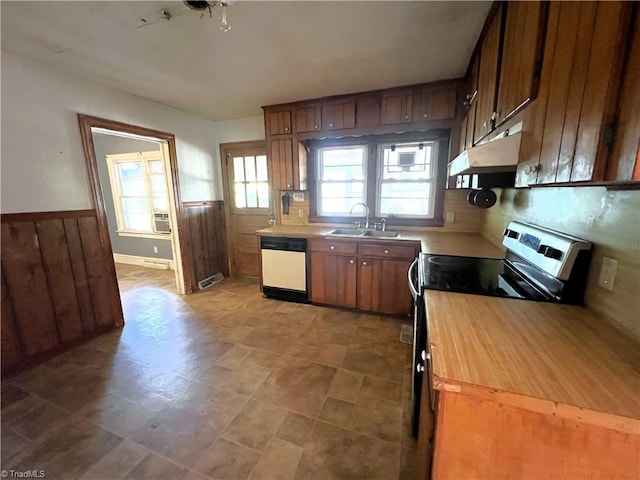 1716 US Highway 220, Stokesdale, NC 27357 - kitchen with dishwasher, a sink, under cabinet range hood, electric range, and a wainscoted wall
