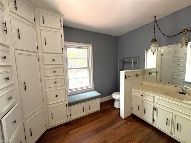 1716 US Highway 220, Stokesdale, NC 27357 - bathroom featuring toilet, wood finished floors, vanity, and baseboards