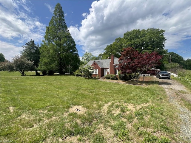 1716 US Highway 220, Stokesdale, NC 27357 - view of green lawn featuring driveway