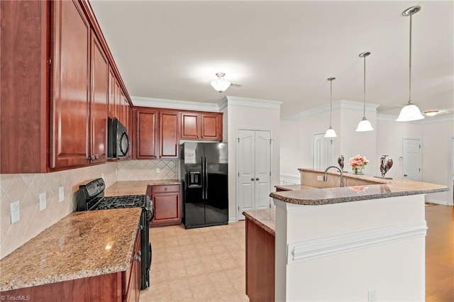 kitchen with ornamental molding, black appliances, a center island with sink, and pendant lighting