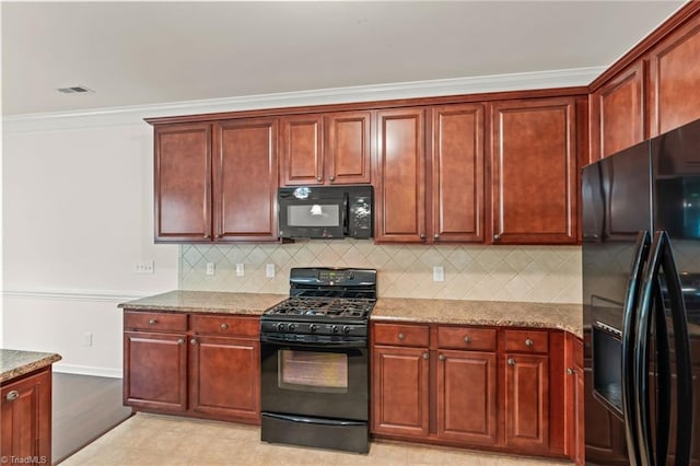 kitchen with black appliances, light stone counters, crown molding, and backsplash