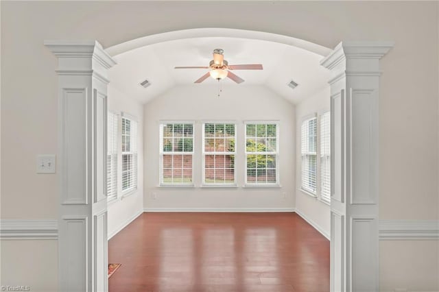 4887 Old Towne Village Cir, Pfafftown, NC 27040 - spare room featuring ornate columns, a ceiling fan, wood finished floors, and visible vents