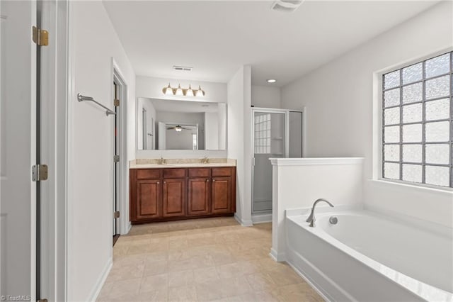 4887 Old Towne Village Cir, Pfafftown, NC 27040 - full bath featuring a sink, a wealth of natural light, a stall shower, and visible vents