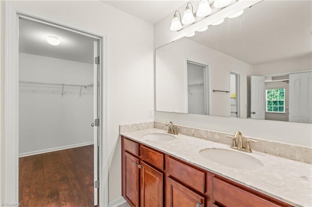 bathroom featuring vanity and hardwood / wood-style flooring