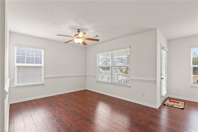 4887 Old Towne Village Cir, Pfafftown, NC 27040 - empty room featuring plenty of natural light, baseboards, ceiling fan, and hardwood / wood-style flooring