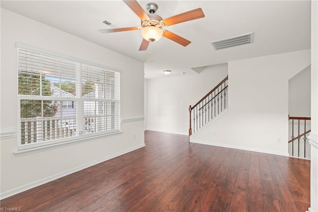 spare room featuring ceiling fan and hardwood / wood-style floors