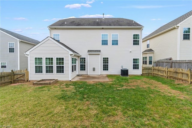 4887 Old Towne Village Cir, Pfafftown, NC 27040 - rear view of house with central air condition unit, a fenced backyard, a yard, and a patio area