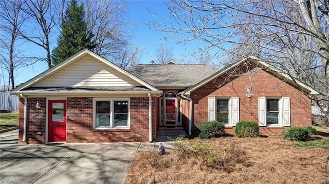 single story home with brick siding