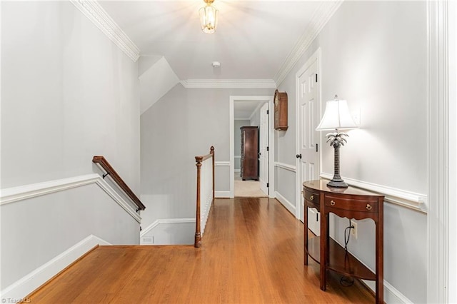 5001 Edinborough Rd, Greensboro, NC 27406 - corridor with an upstairs landing, wood finished floors, and crown molding