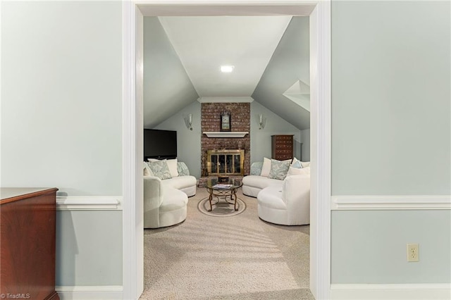 5001 Edinborough Rd, Greensboro, NC 27406 - living area with lofted ceiling, carpet, and a fireplace
