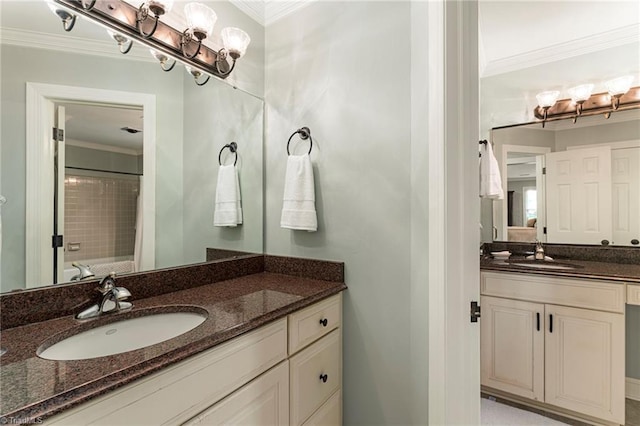 5001 Edinborough Rd, Greensboro, NC 27406 - bathroom with crown molding, two vanities, a sink, and curtained shower
