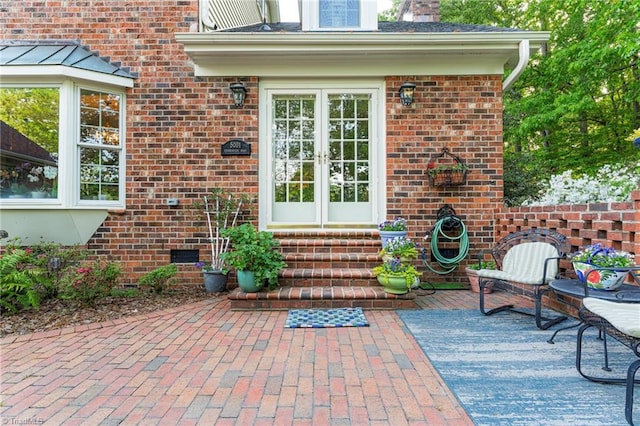 5001 Edinborough Rd, Greensboro, NC 27406 - entrance to property featuring a patio area, french doors, and brick siding