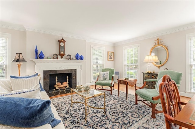 5001 Edinborough Rd, Greensboro, NC 27406 - living room with baseboards, ornamental molding, wood finished floors, and a fireplace with flush hearth