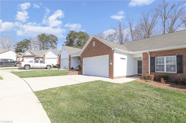 single story home with roof with shingles, a front lawn, concrete driveway, a garage, and brick siding