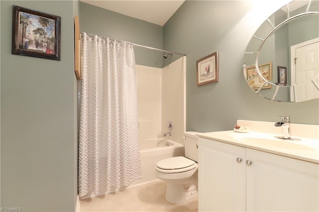 bathroom featuring vanity, shower / tub combo, and toilet