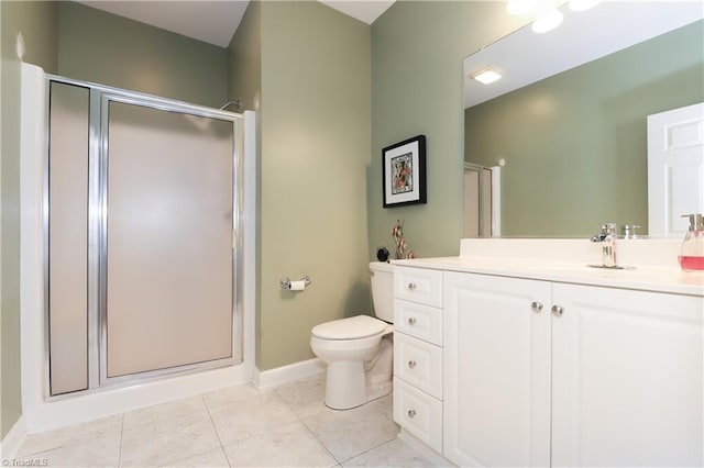 full bathroom with a stall shower, toilet, vanity, and baseboards