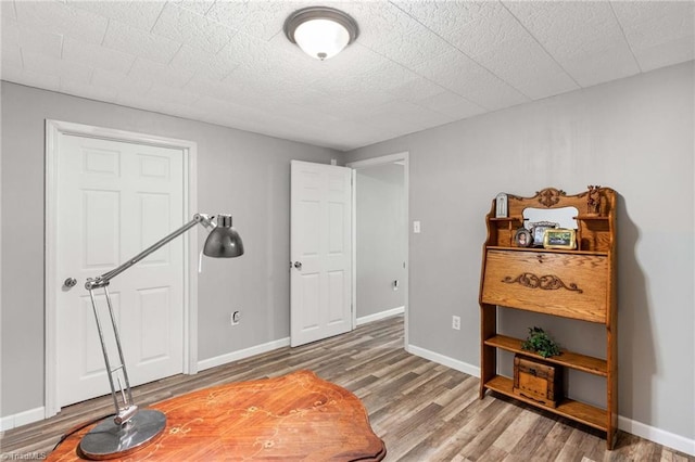 miscellaneous room with hardwood / wood-style floors